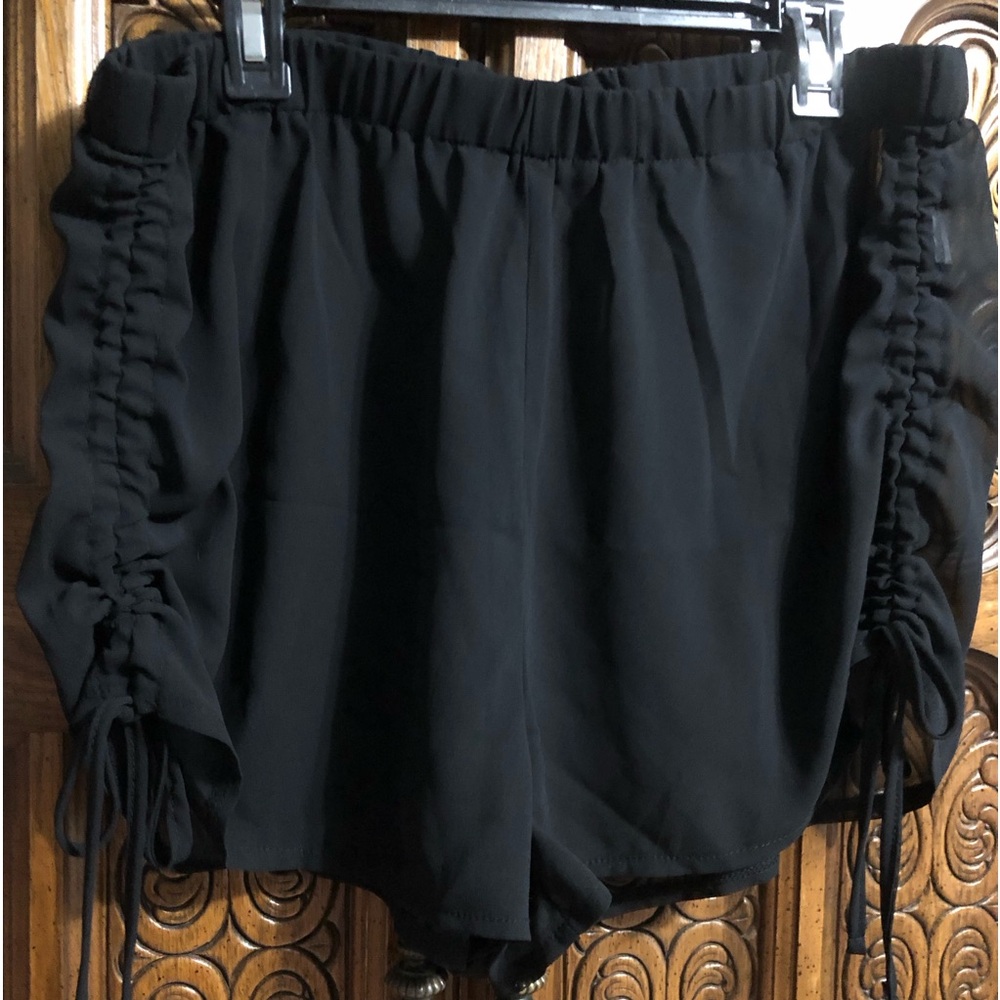 Black sheer cover-up shorts